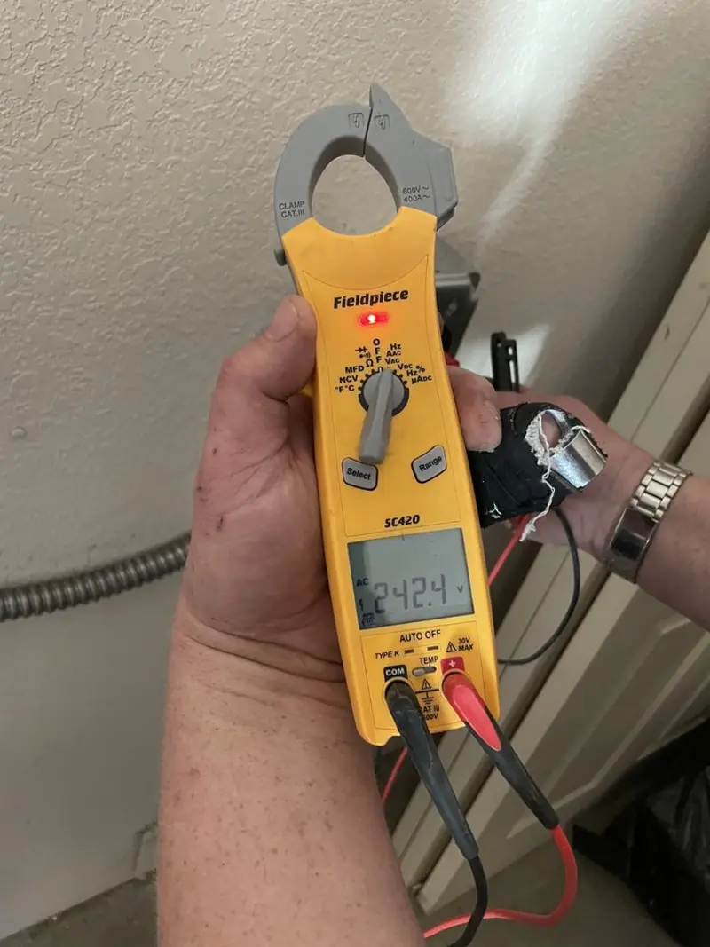 Voltage testing with clamp meter during Generator Installation in Medway